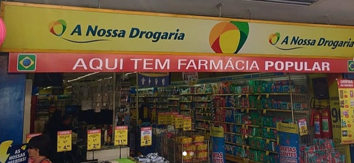 LKL — fachada e sinalização para A Nossa Drogaria